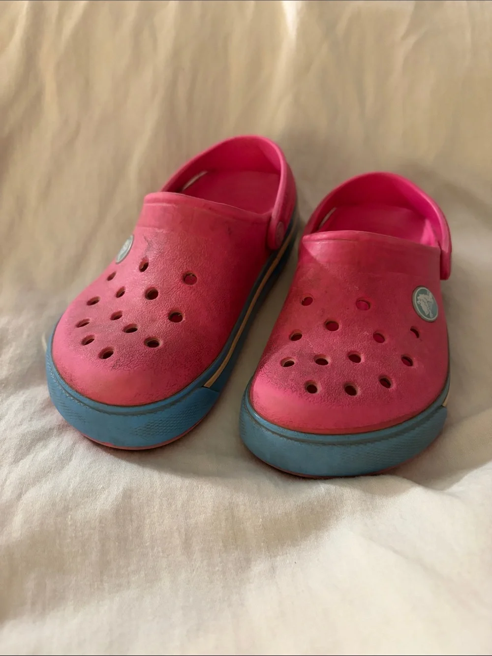 CROCS Kids Pink Clogs with Blue Soles